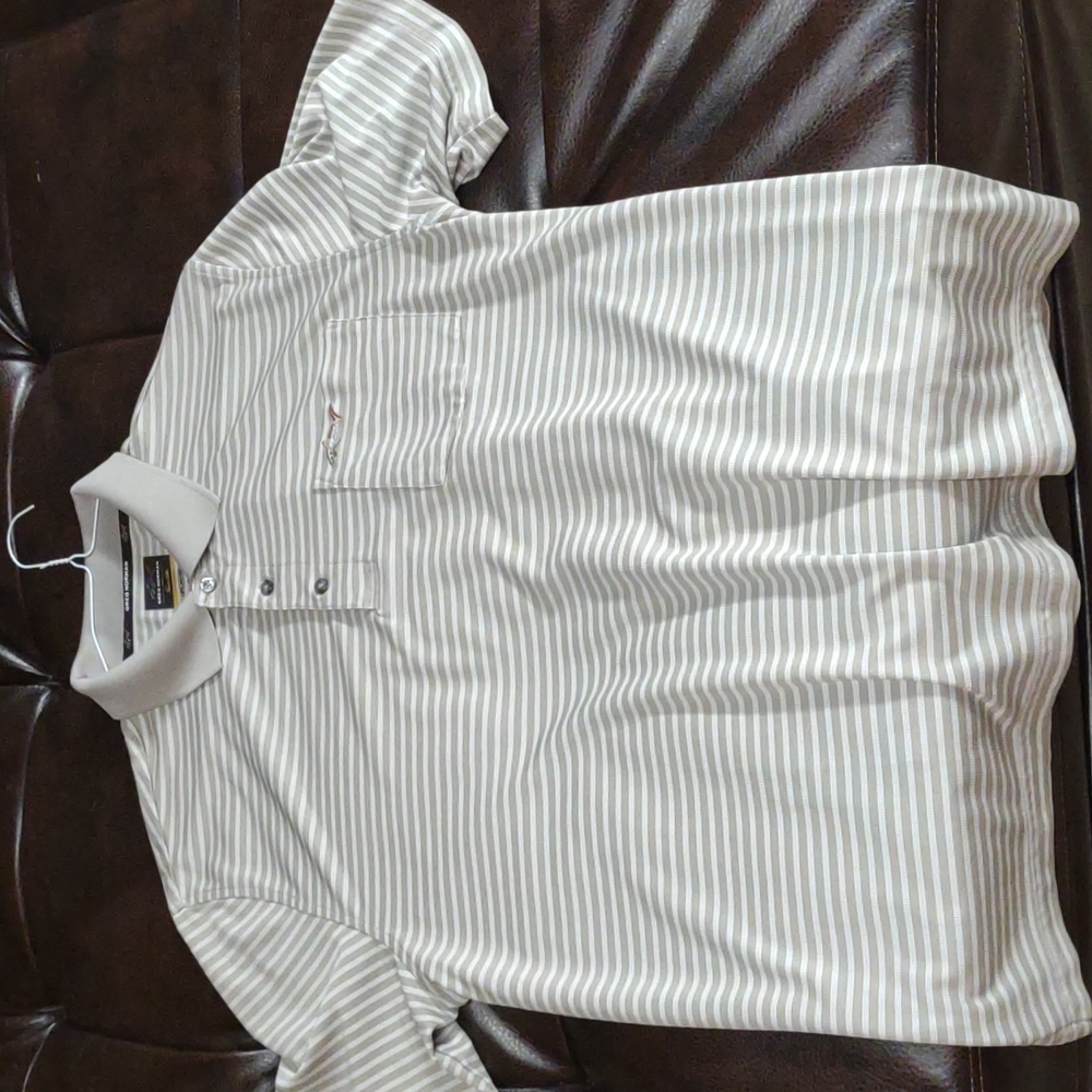 Greg Norman dry fit golf polo.